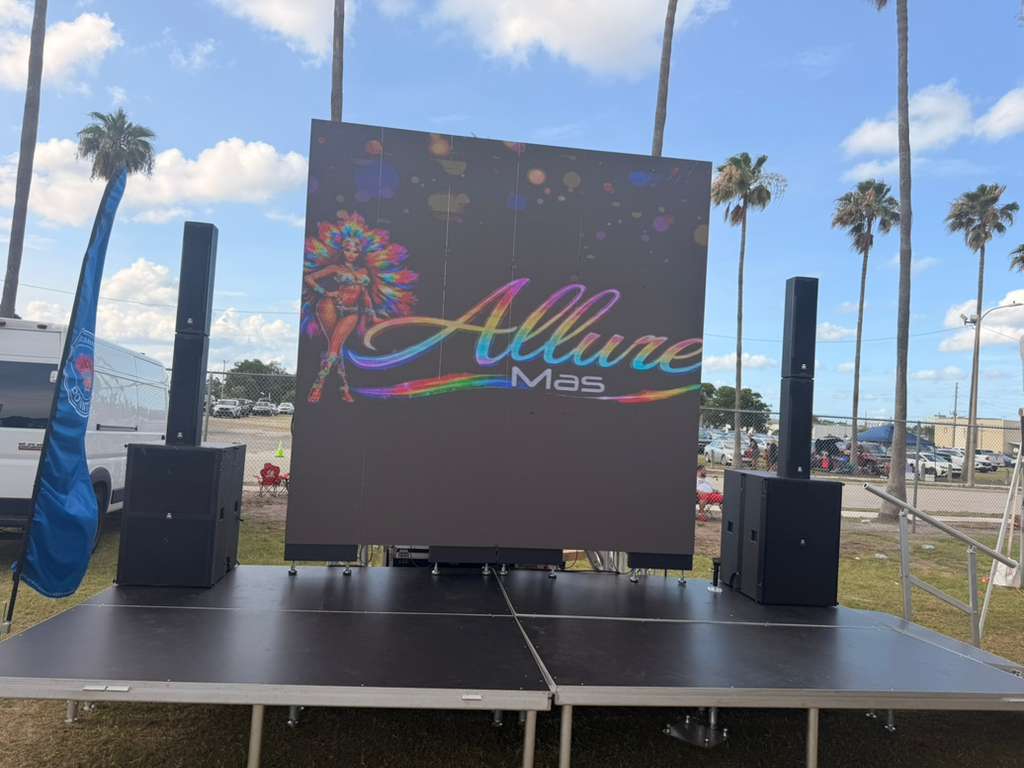 Outdoor LED video wall and line array speakers for Allure Mas event