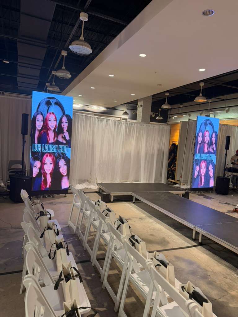 Dual vertical LED columns and runway setup for Lux Lavish Hair show
