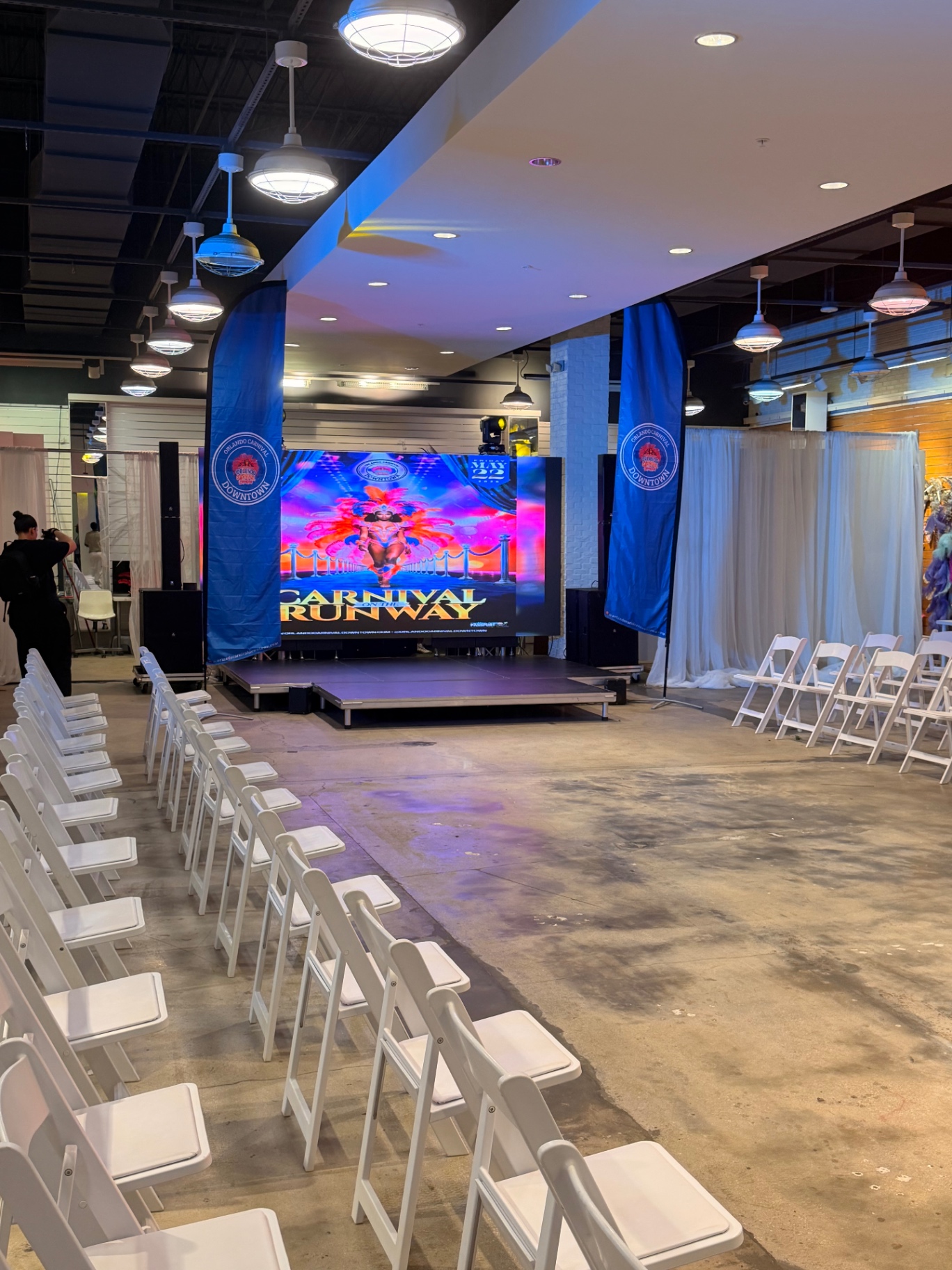 Carnival Runway indoor stage with LED wall and vertical event banners